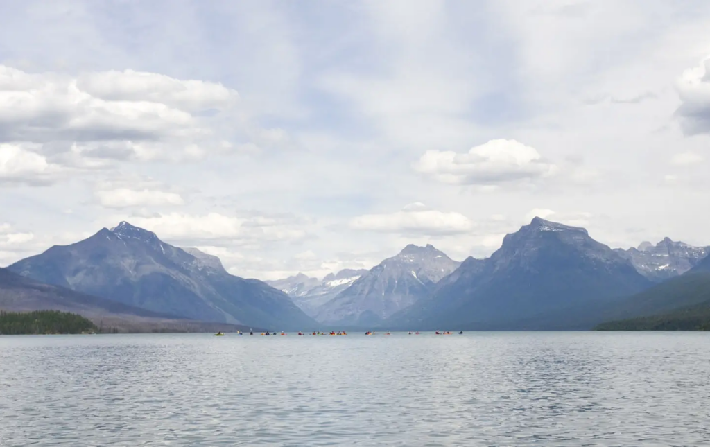 Mountain range reflected in calm lake