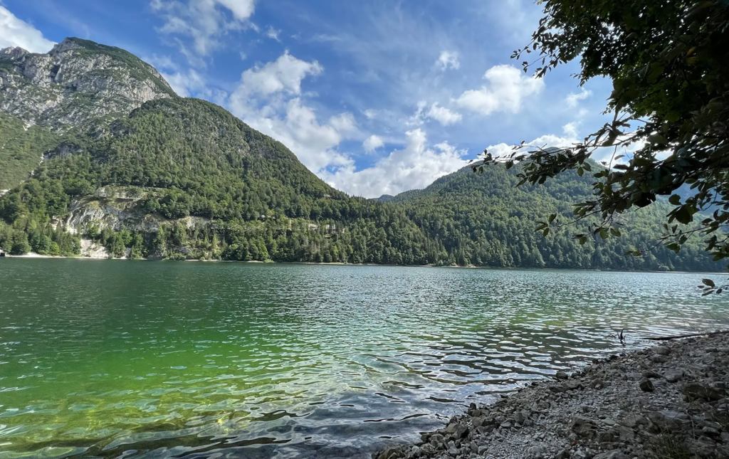 Scenic lake with lush green hills